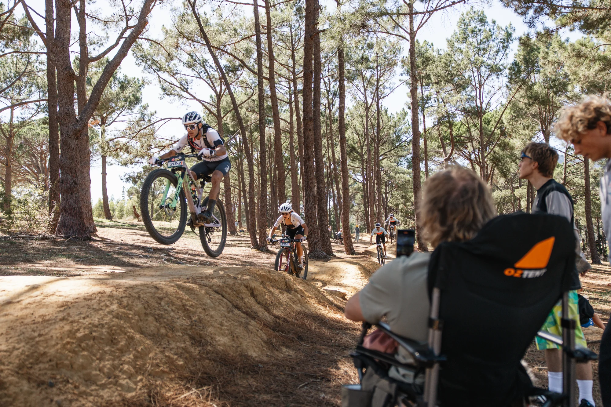 Riders on a forest trail