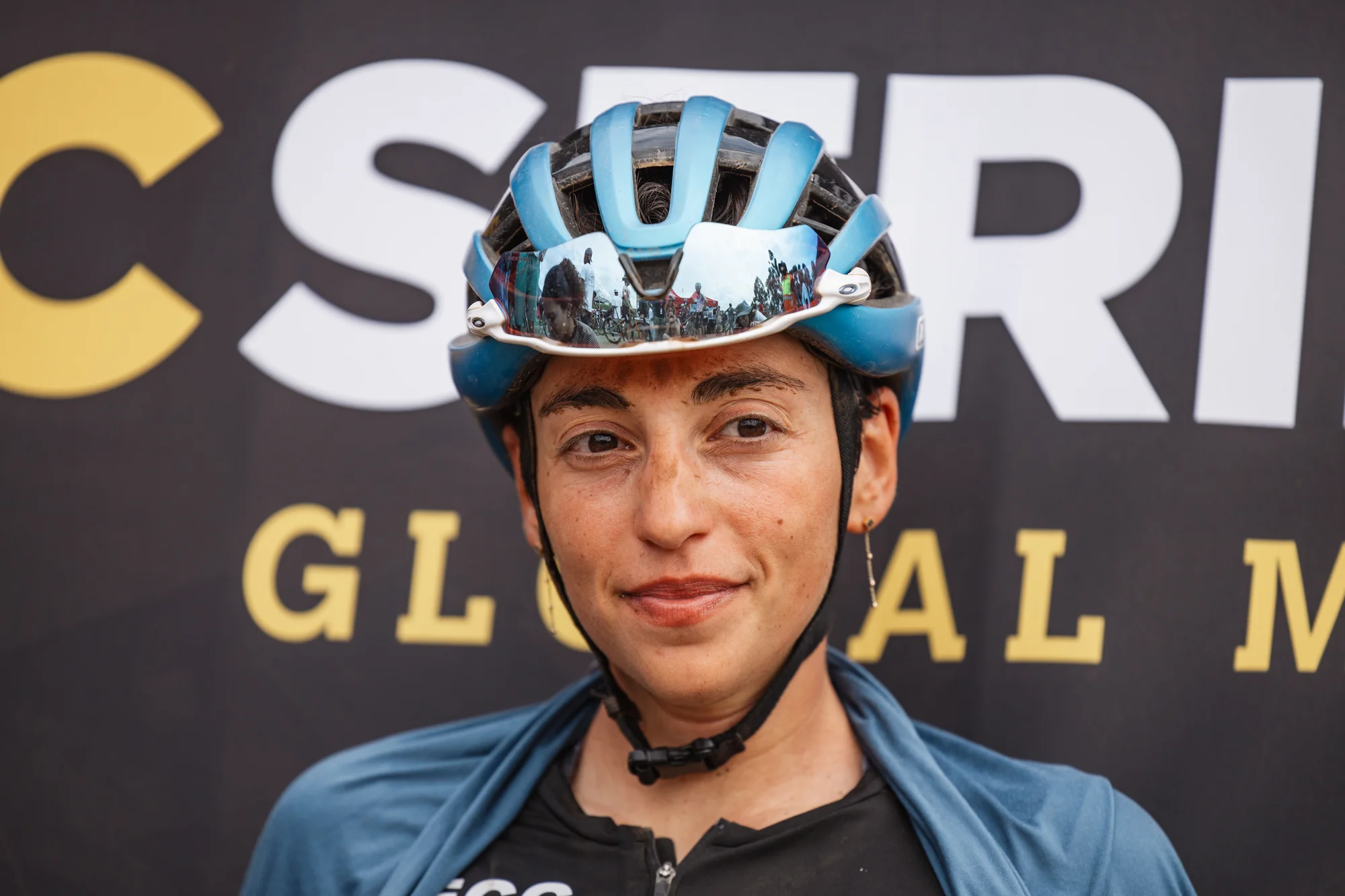 A rider's portrait, muddy face