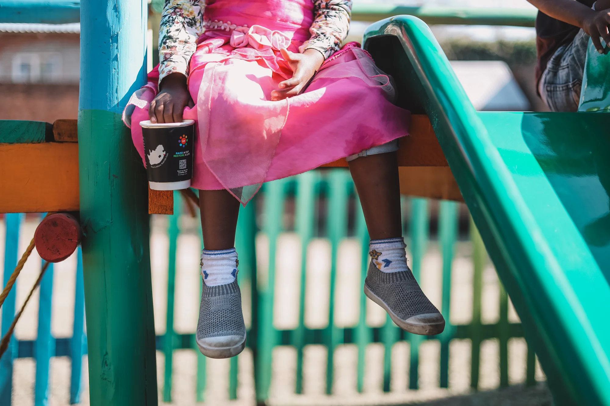A child on a playground slide