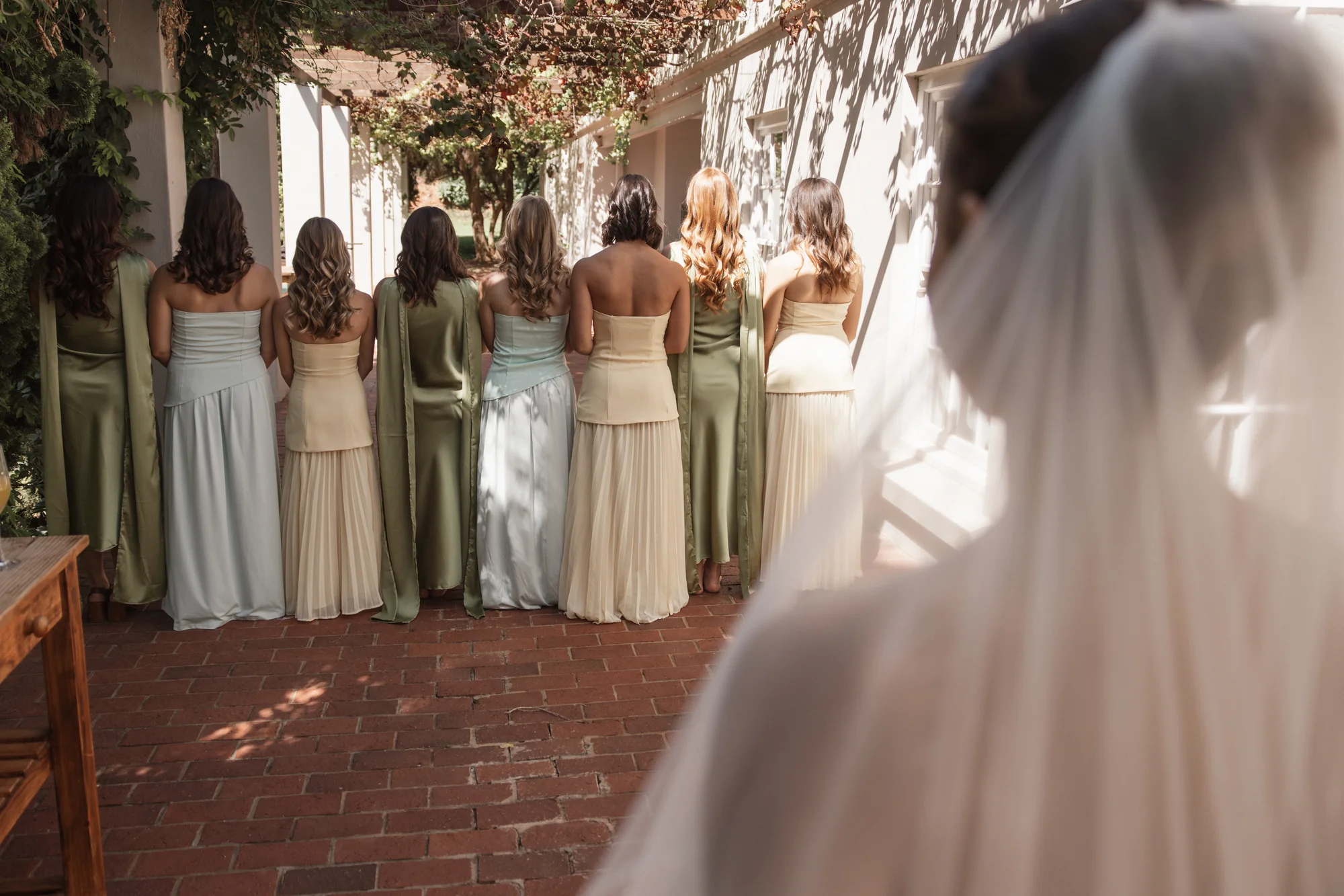 The bridesmaids walking together
