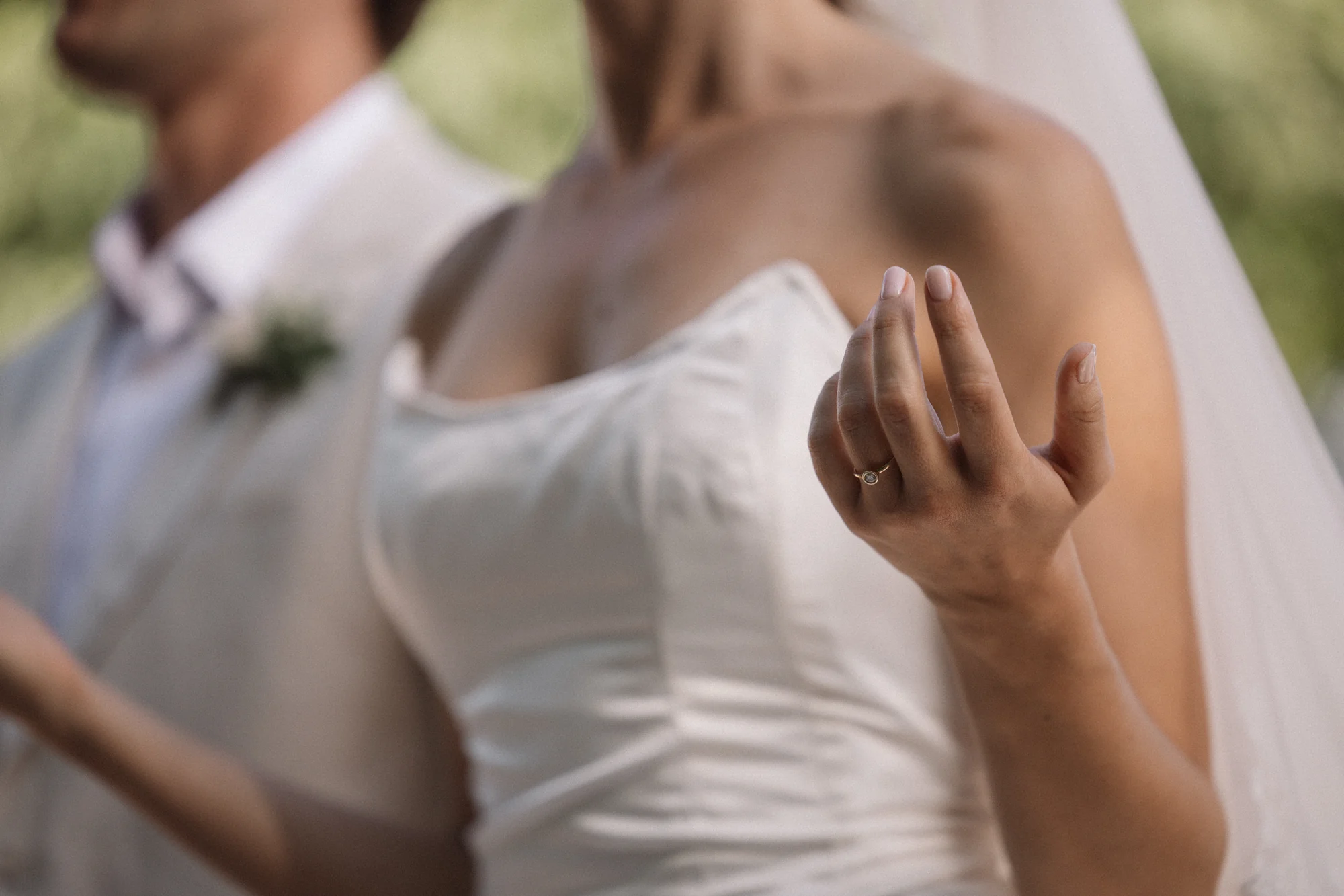 A detail of the wedding dress